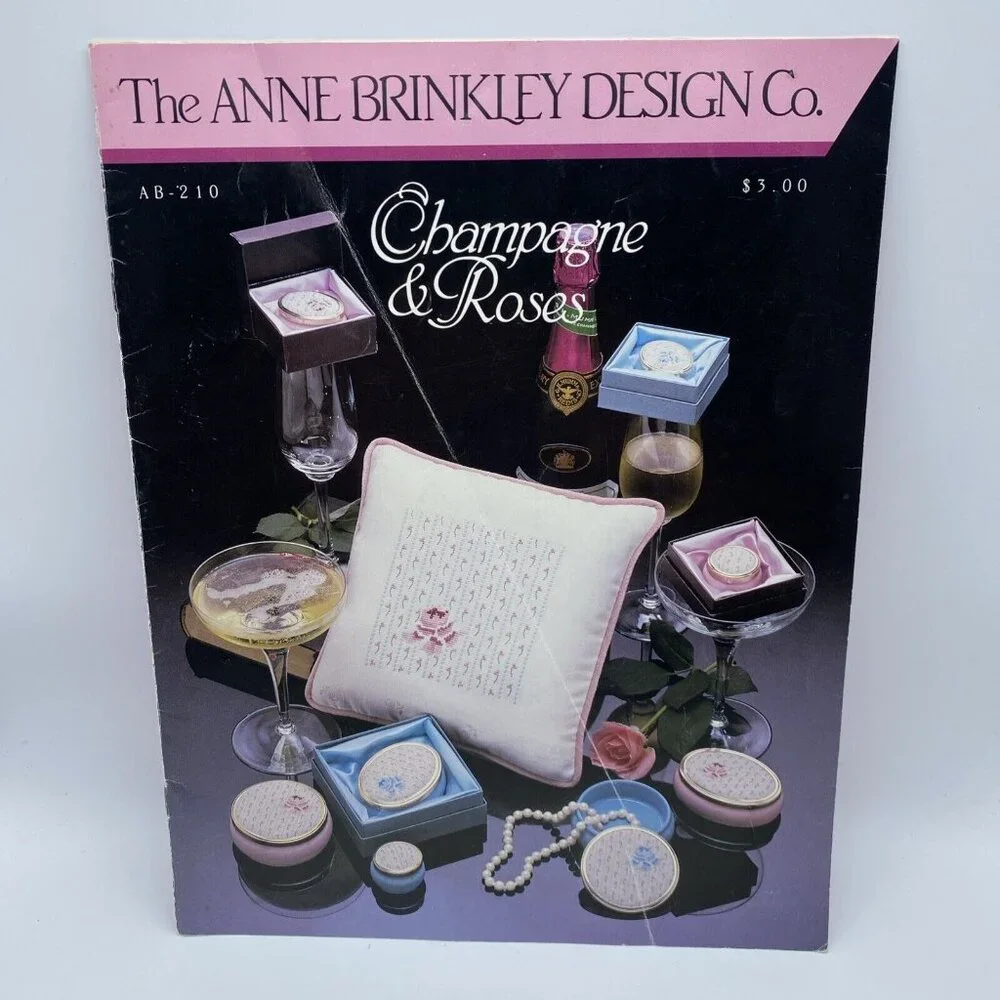 Anne Brinkley Design Co. Cross Stitch Patterns: Champagne & Roses, AB-210